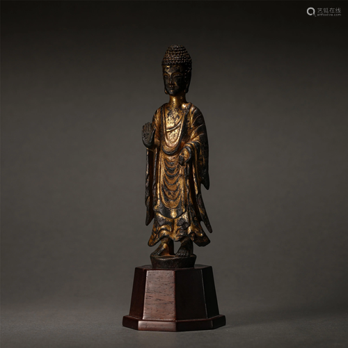 A Chinese Gilt Bronze Standing Buddha