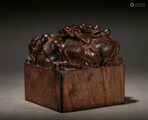 A Chinese Carved Hardwood Beast Seal