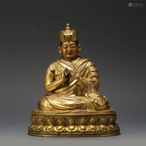 A Gilt Bronze Seated Guru