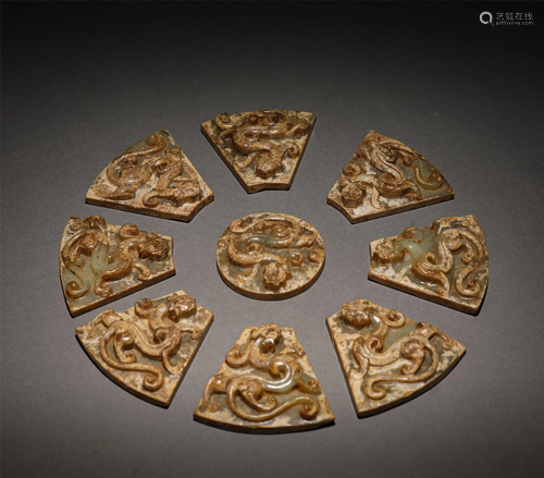 A Set of Carved Jade Dragons Bi