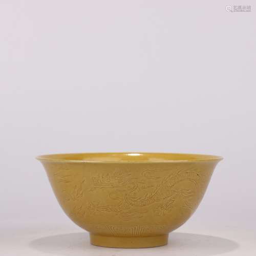 AN INCISED YELLOW GLAZE DRAGON BOWL