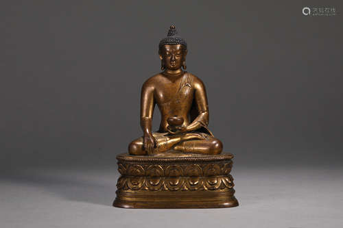 A BRONZE FIGURE OF BUDDHA