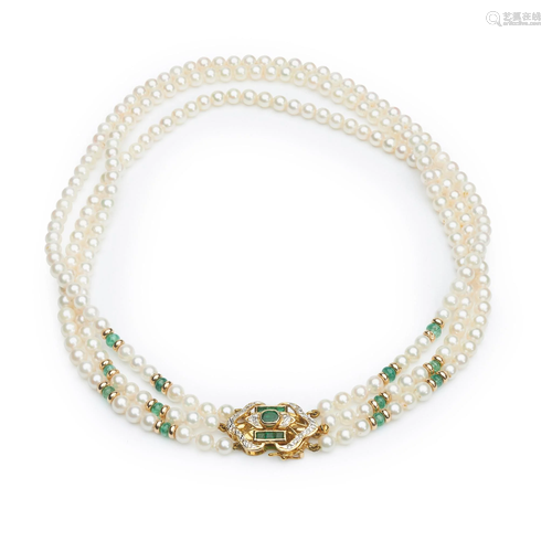 A pearl and emerald necklace