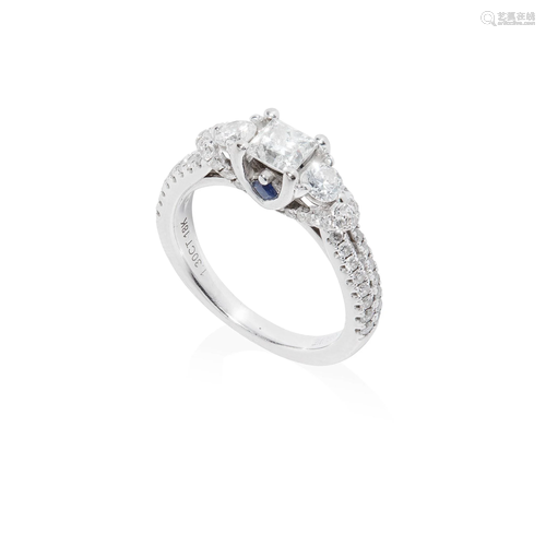 A three-stone diamond ring, by Vera Wang