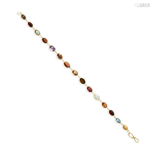 A multi-gem bracelet and earrings