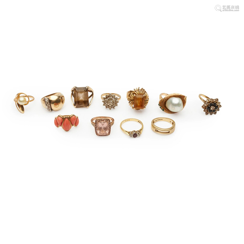 A collection of eleven gold and gem-set rings