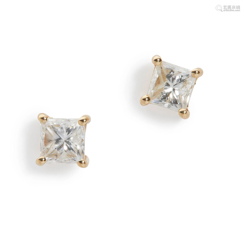 A pair of diamond stud earrings