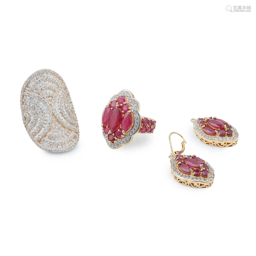 A ruby dress ring and matching earrings