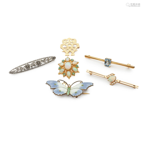 A collection of brooches