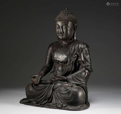 In the Ming Dynasty, a bronze statue of Sakyamuni Buddha