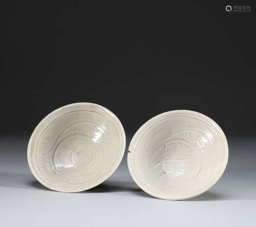 In Song Dynasty, Ding kiln carved fish pattern plate