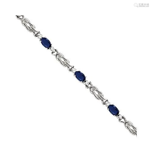 Oval Blue Sapphire and Diamond Love Knot Bracelet 14k W