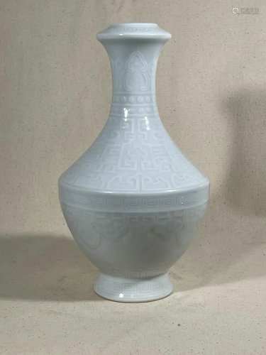 Chinese White Porcelain Vase with Carved Low Relief