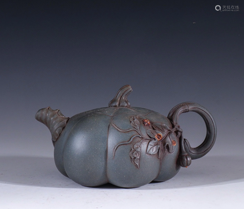 A Chinese Carved Yixing Clay Teapot