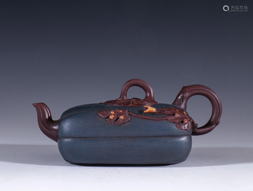 A Chinese Carved Yixing Clay Teapot