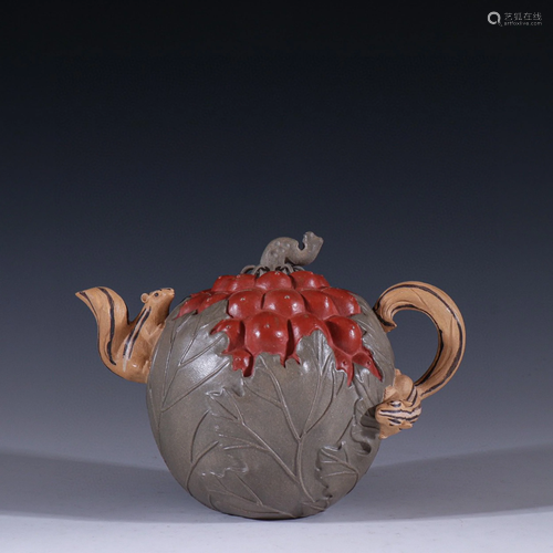 A Chinese Carved Yixing Clay Teapot