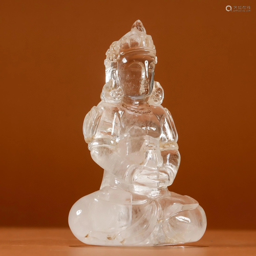 A Chinese Carved Rock Crystal Figure of Buddha