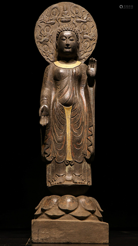 A Chinese Carved Stone Figure of Buddha