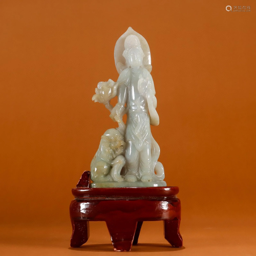 A Chinese Carved Jade Figure of Buddha