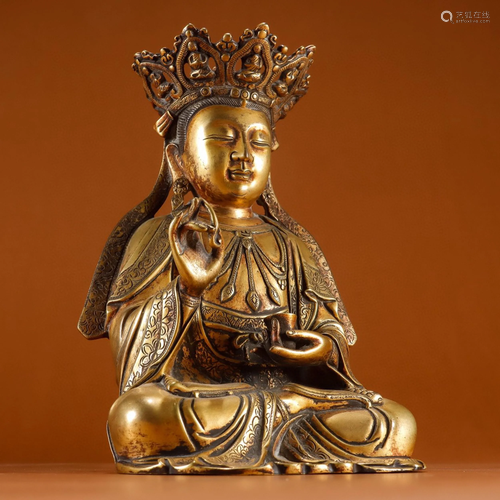 A Chinese Gilt Bronze Figure of Buddha