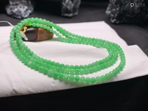 A Chinese Carved Jadeite Bead Chain