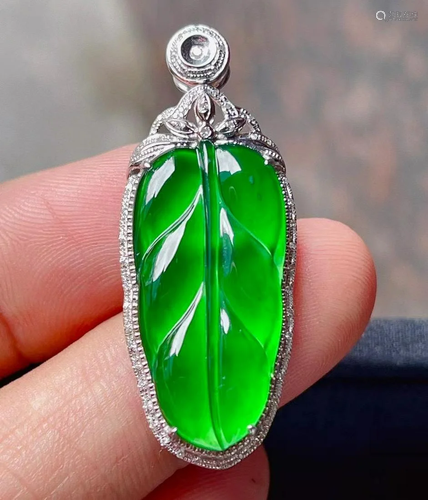 A Chinese Carved Jadeite Pendant (W/O Chain)