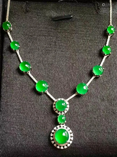 A Chinese Carved Jadeite Necklace