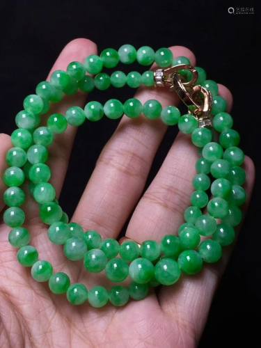 A Chinese Carved Jadeite Bead Chain