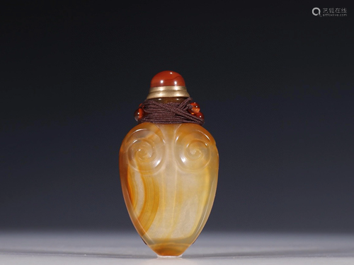 A Chinese Carved Stone Snuff Bottle