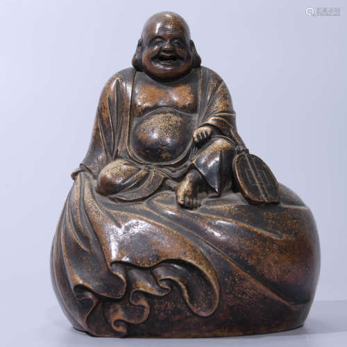  A POTTERY FIGURINE OF MONK