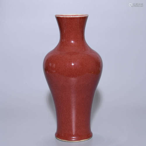 AN ALTAR RED GLAZE GUANYIN VASE