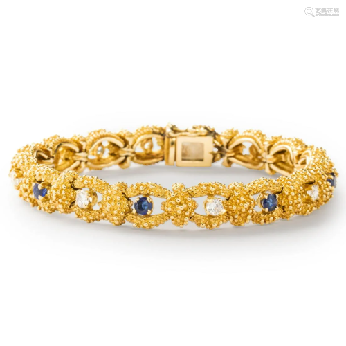 An eighteen karat gold, sapphire and diamond bracelet