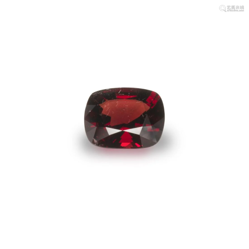 An unmounted red spinel