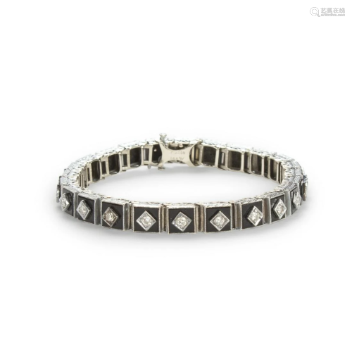 An Art Deco diamond and black chalcedony bracelet