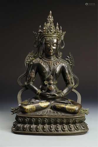 A GOLD PAINTED BRONZE BUDDHA STATUETTE