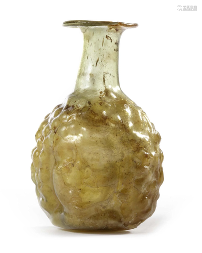 A ROMAN GLASS HONEYCOMB BOTTLE, 1ST-3RD CEN…