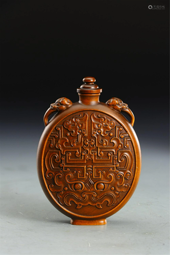 A HARDWOOD CARVED CHI-DRAGONS SNUFF BOTTLE