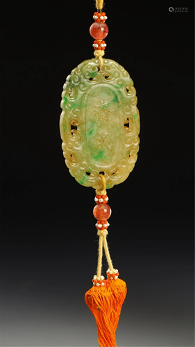 A JADEITE CARVED FASTING PENDANT