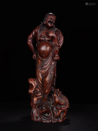 A CHENXIANG WOOD CARVING OF FIGURE AND TOAD