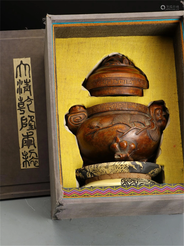 A CHENXIANG WOOD CARVED 'PINE' INCENSE BURNER