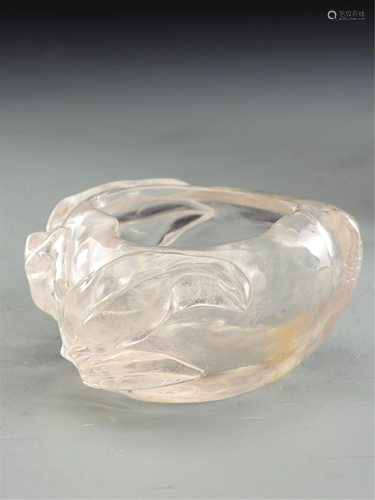 A PEACH SHAPED CRYSTAL WASHER