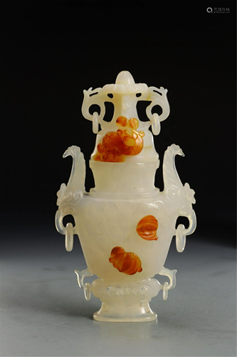 A CARVED AGATE BOTTLE AND COVER