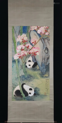 A CHINESE PAINTING OF PANDAS