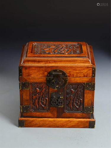 A HARDWOOD CARVED LIDDED BOX