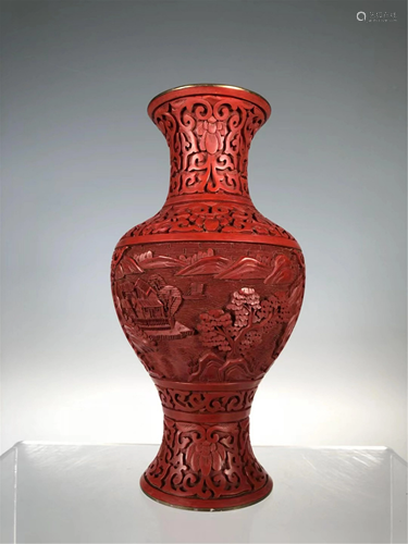 A CARVED RED LACQUER LANDSCAPE VASE