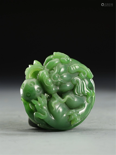 A JASPER CARVING OF BEAST PLAYING A BALL