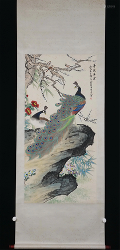 A CHINESE PAINTING OF FLOWERS AND BIRDS