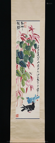 A CHINESE PAINTING OF FLOWERS AND BIRDS