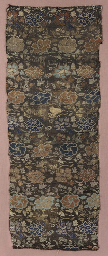 A CHINESE GOLD BROCADED SILK PANEL WITH FLOWERS AND