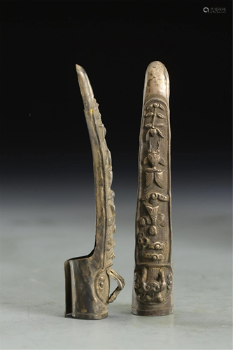 PAIR OF SILVER CARVED FINGER DECORATIONS